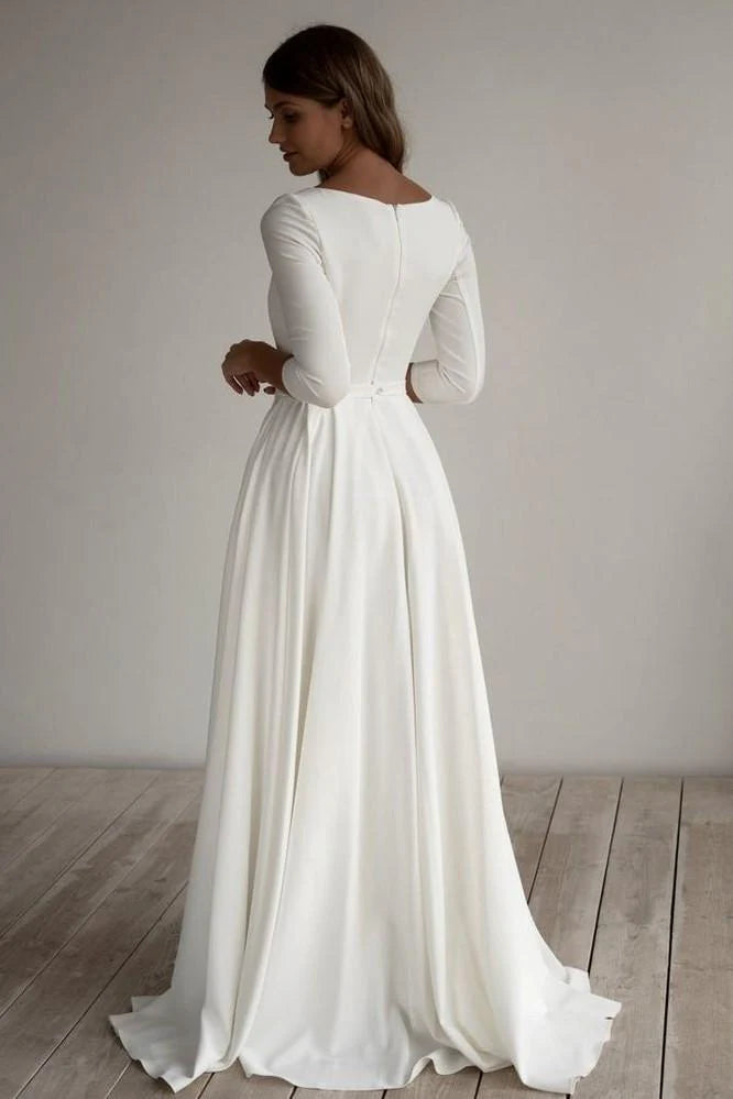 Robe de mariée trapèze simple, longueur au sol, manches 34, en satin, avec poches 