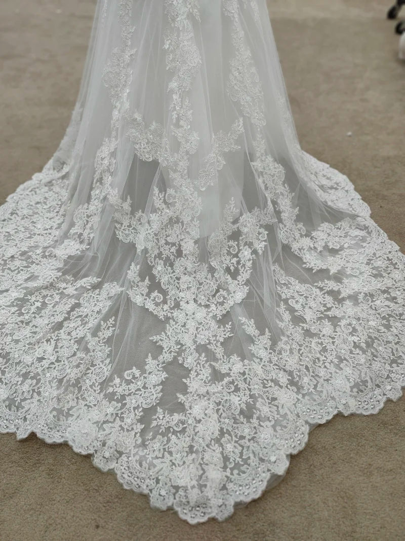 Robe de mariée bohème simple, dos nu, col en V, manches longues, dentelle, avec traîne