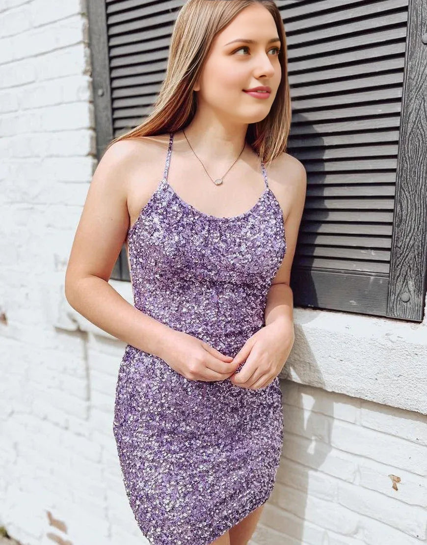 Robe de soirée moulante dos nu à sequins et dos croisé