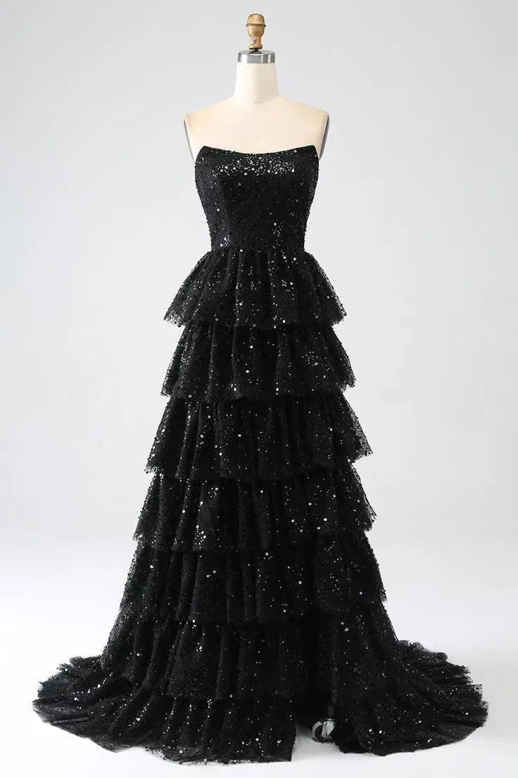 Back view of the black sequin prom dress, highlighting the lace-up corset back detail.