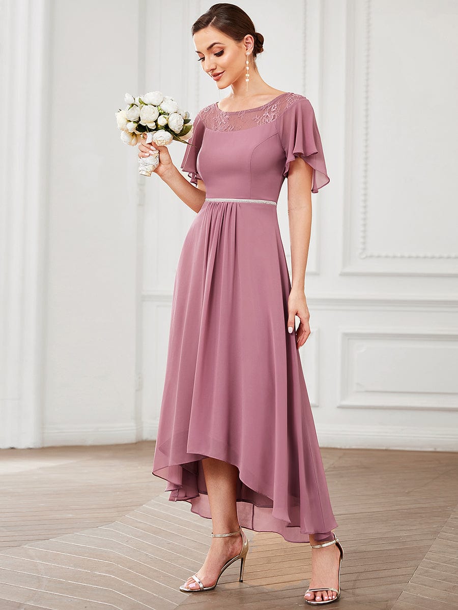 Model wearing an olive green Weitese A-line midi dress with boat neck and asymmetrical hem.