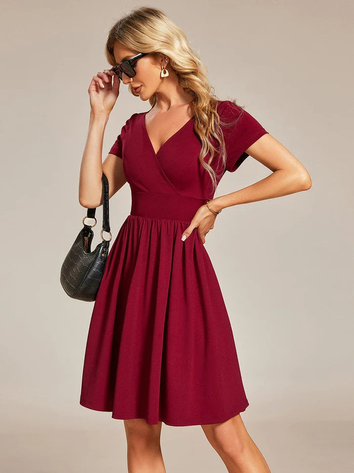 Model walking, showing the movement and comfort of the Weitese A-line mini dress.
