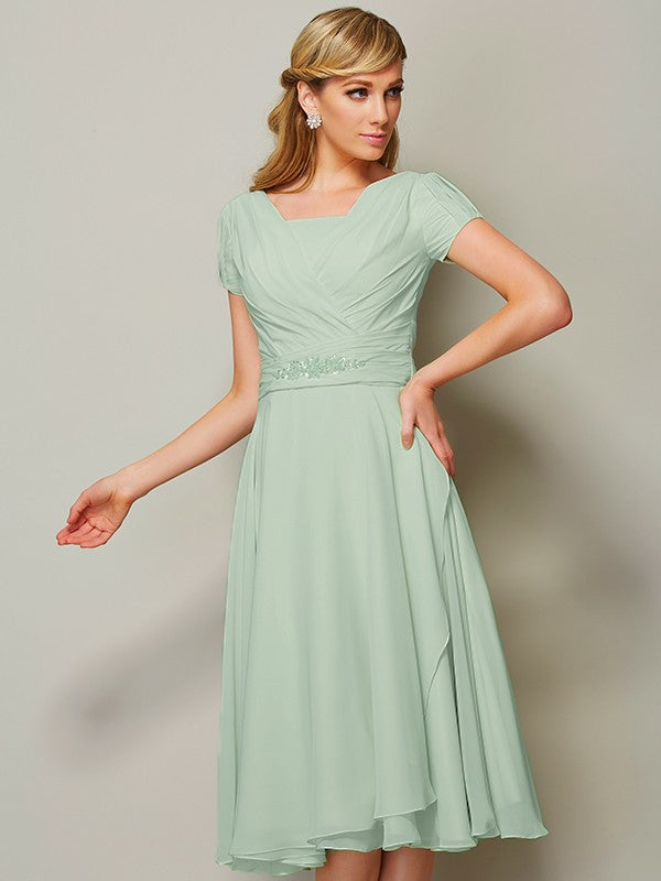 Weitese sheath bateau short sleeve ruffled chiffon tea-length bridesmaid dress, front view.
