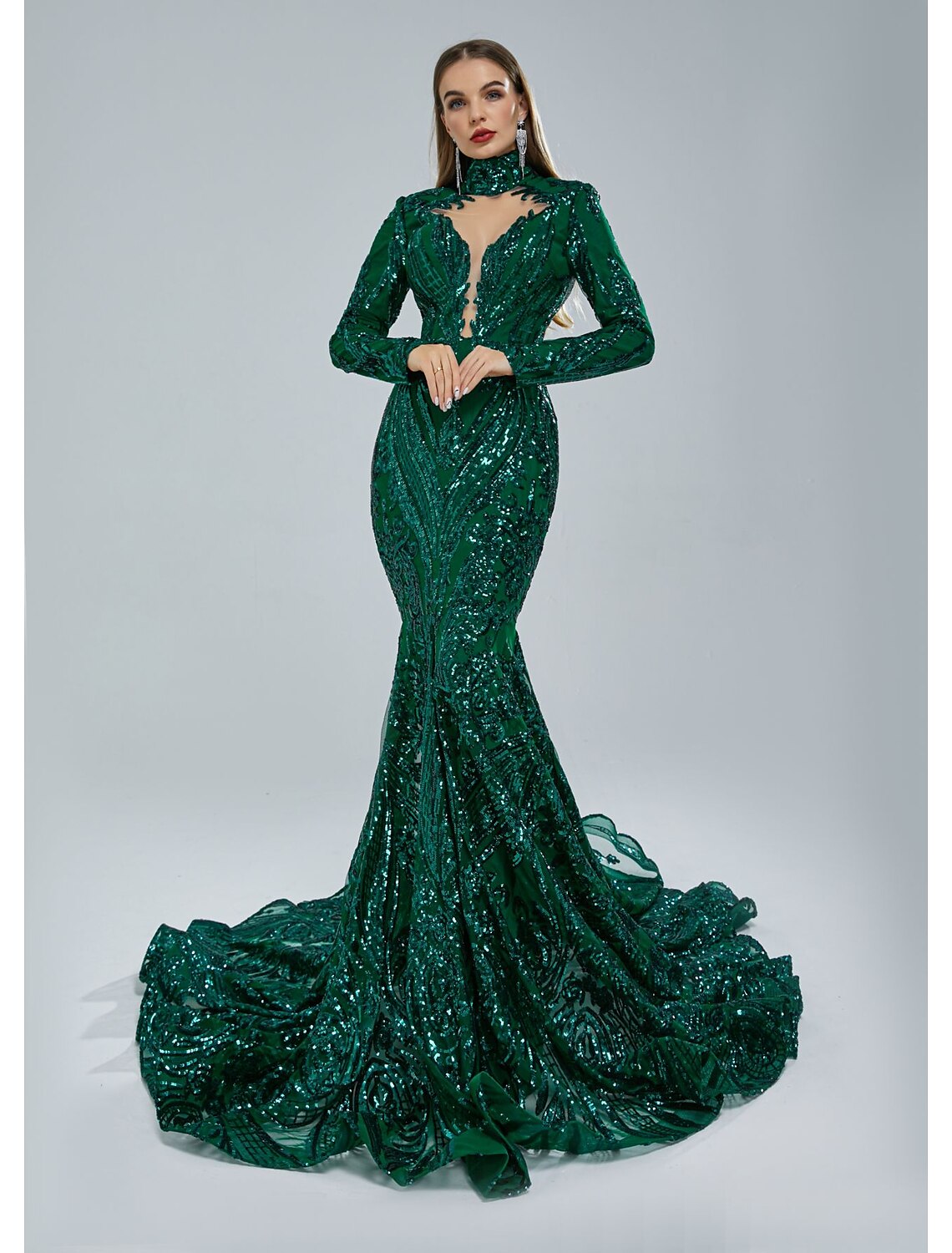 Woman wearing a dazzling Weitese mermaid long sleeve evening gown with a stand collar and court train.