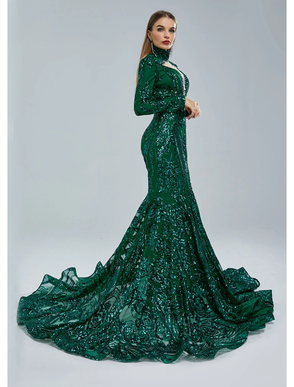 Back view of the red mermaid gown, showcasing the elegant court train.
