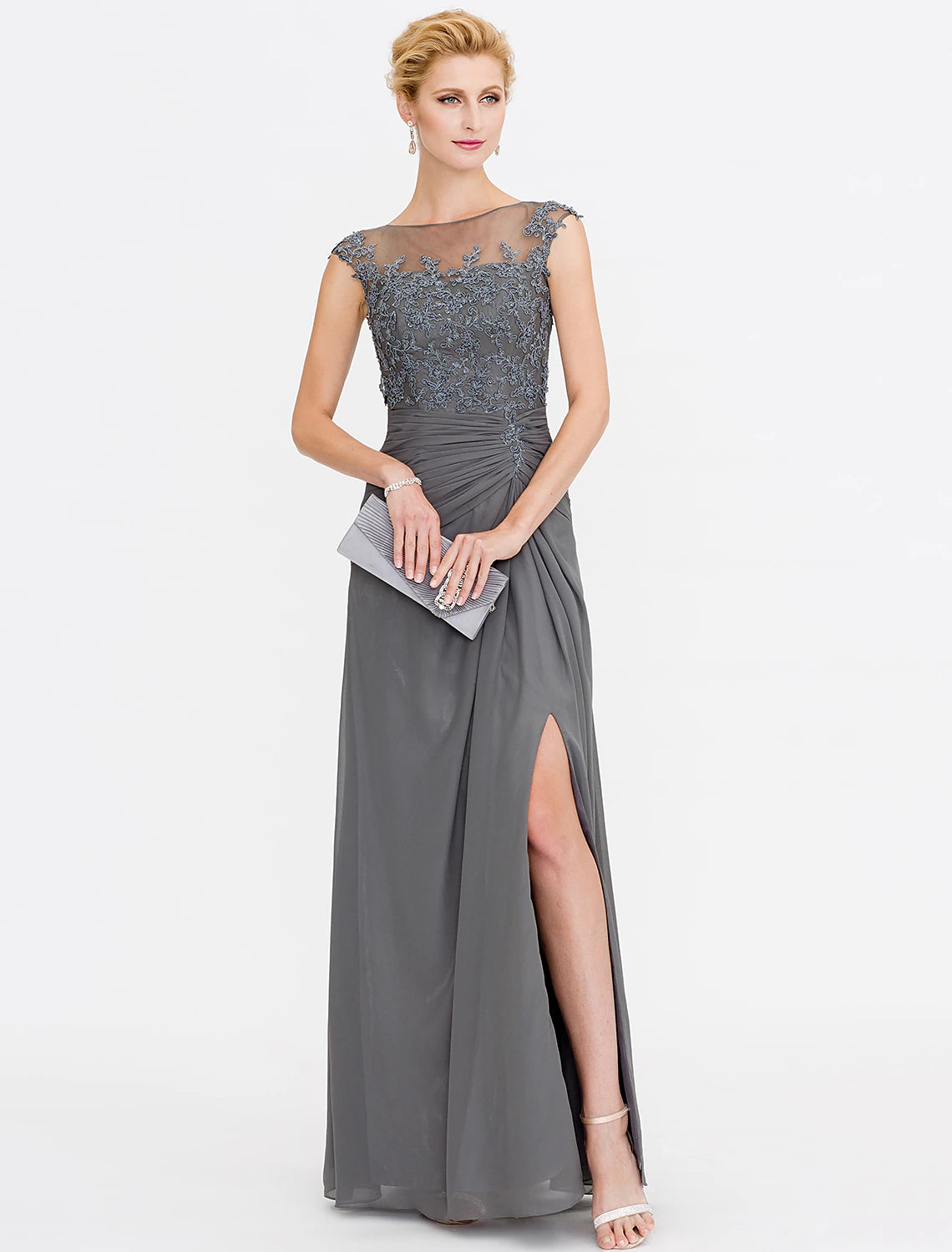 Close-up of the bateau neck and see-through chiffon lace on the dress.