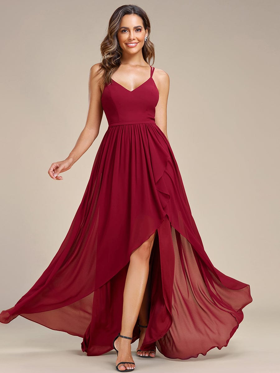 Blue A-line chiffon bridesmaid dress with delicate spaghetti straps.