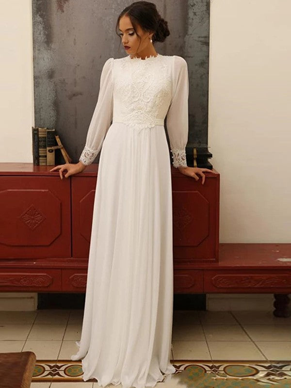 Elegant A-Line chiffon and lace wedding dress with long sleeves and jewel neckline.