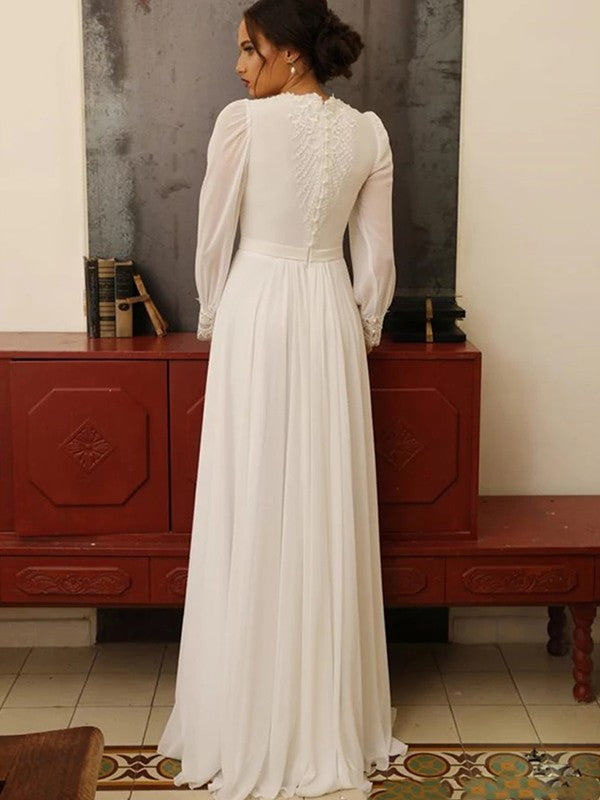 Back view of a floor-length A-Line bridal gown featuring lace details.