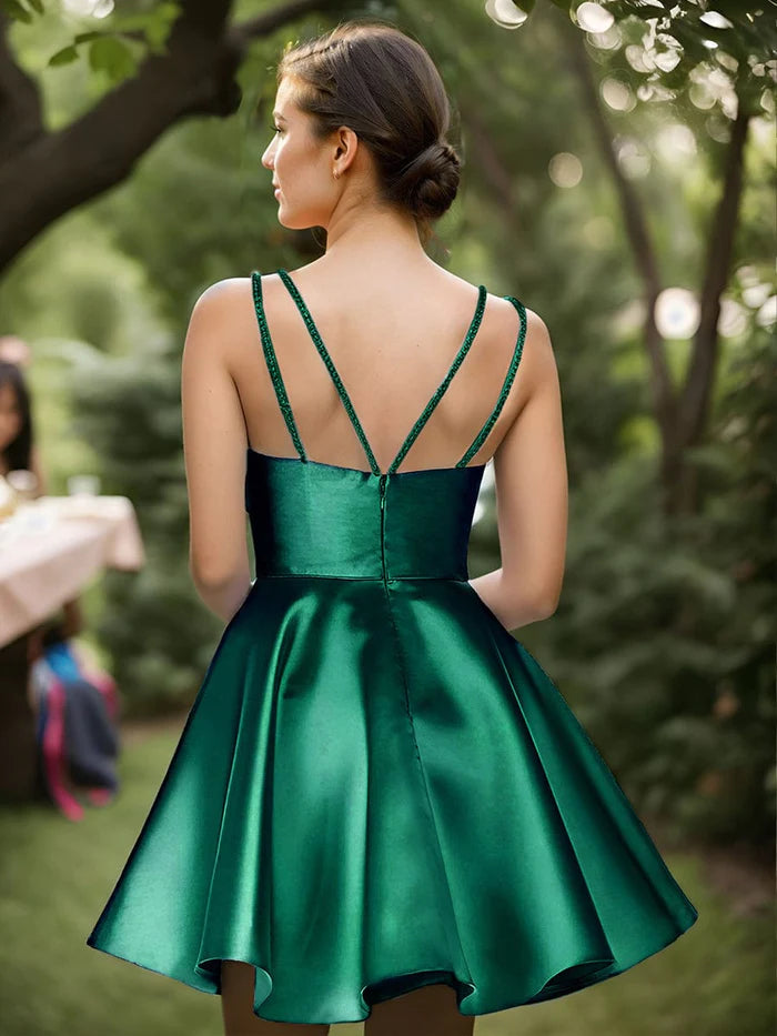 Model gracefully moving in the Weitese short A-Line dress, showing the drape of the satin.