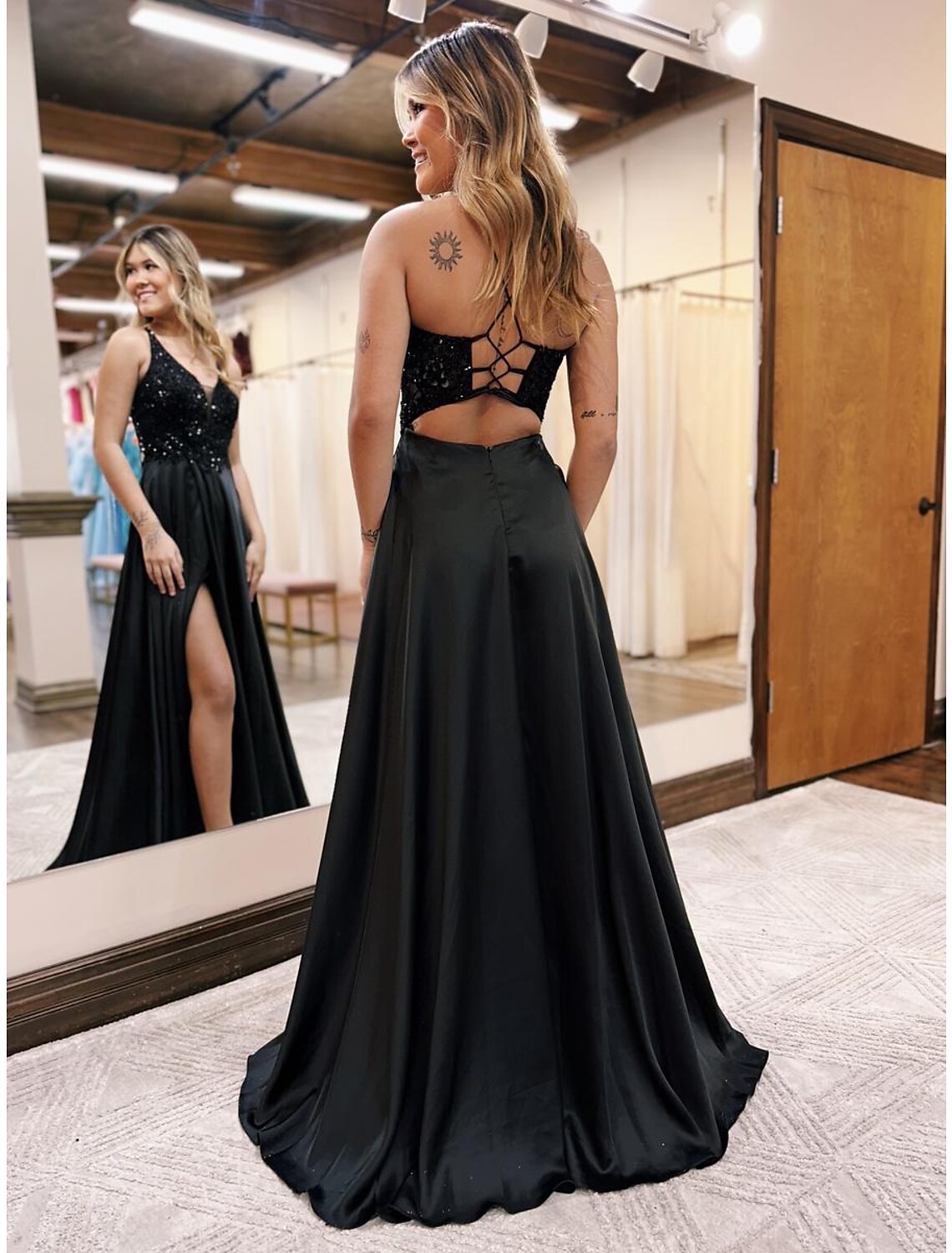 Backless design of the Weitese satin A-Line evening gown.