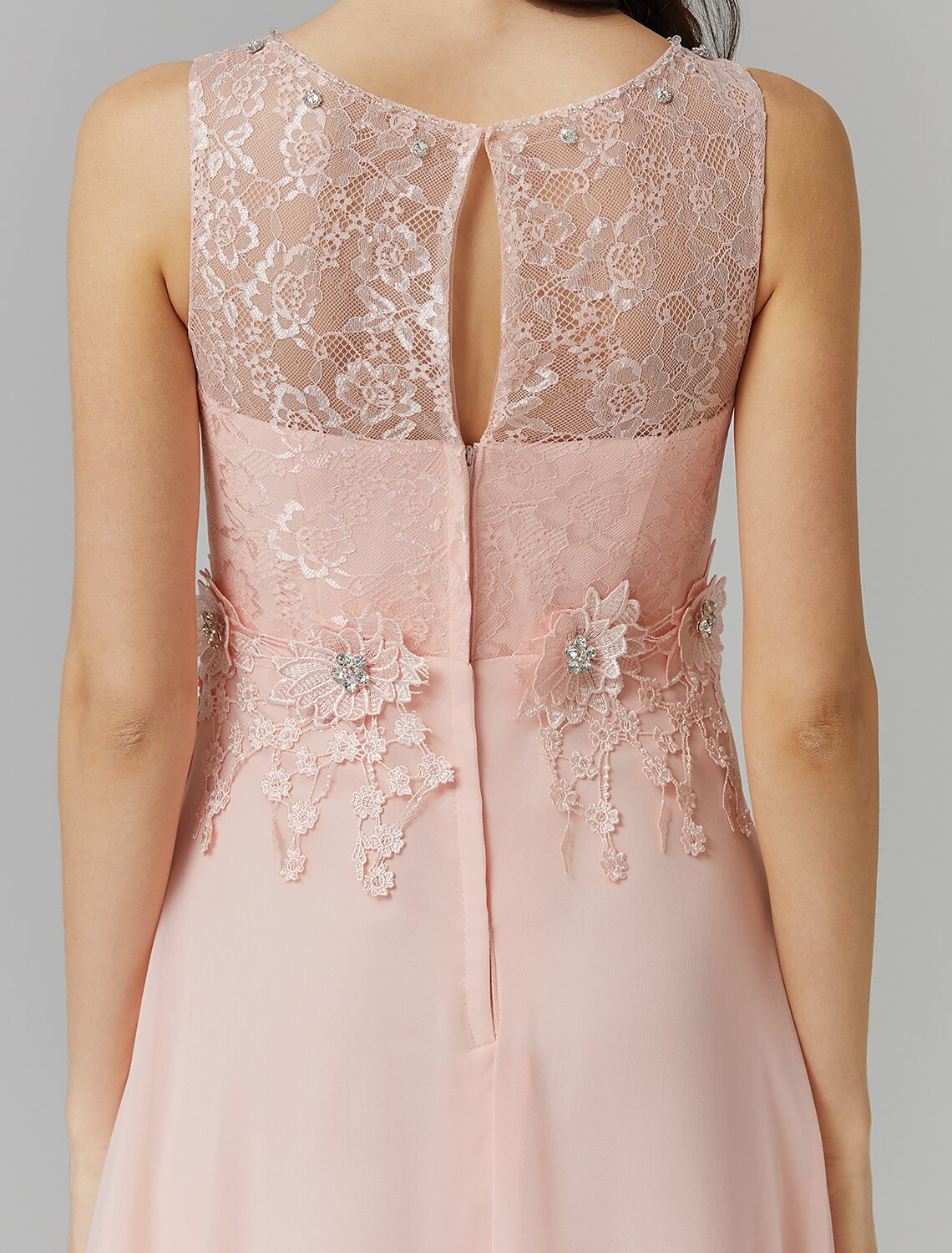 Detail of the appliques and beading on the bodice of the A-Line dress.