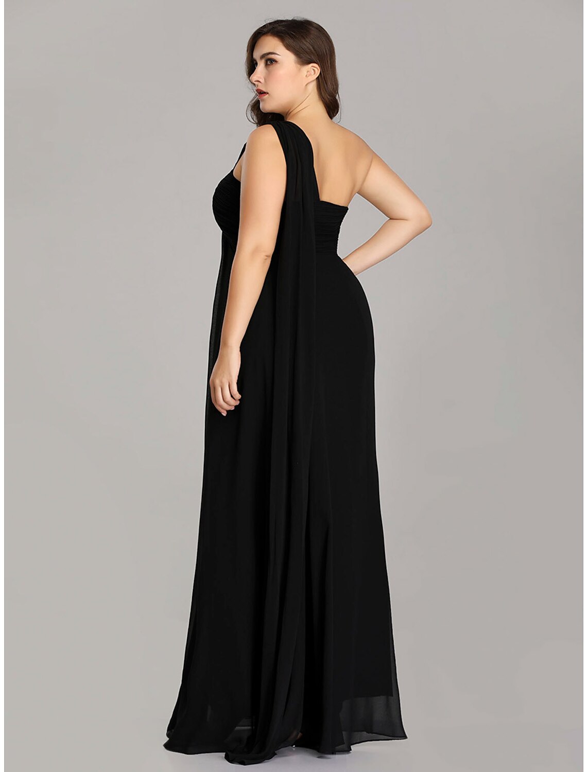 Back view of the A-line empire one-shoulder chiffon evening gown, showcasing the backless design.