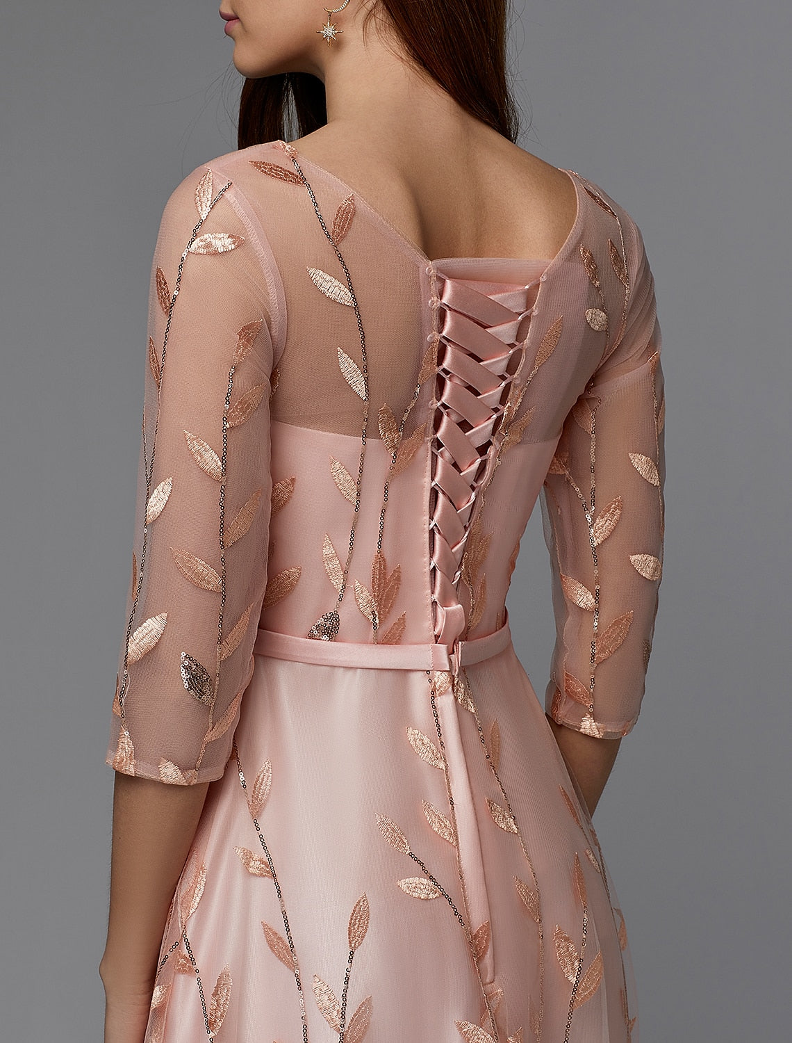 Model posing in the Weitese A-line floral lace dress, full view.