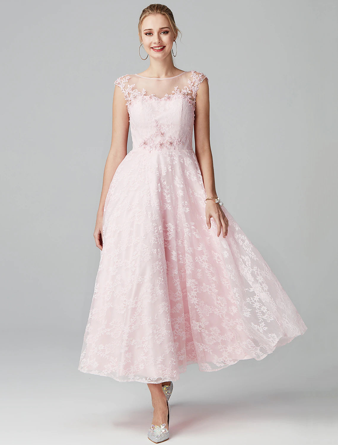 Model wearing Weitese A-Line floral lace prom dress, front view.