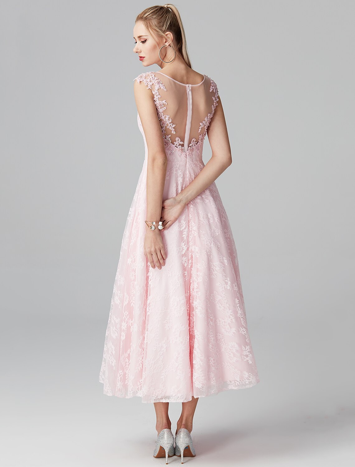 Model in Weitese A-Line dress, side profile showing silhouette.