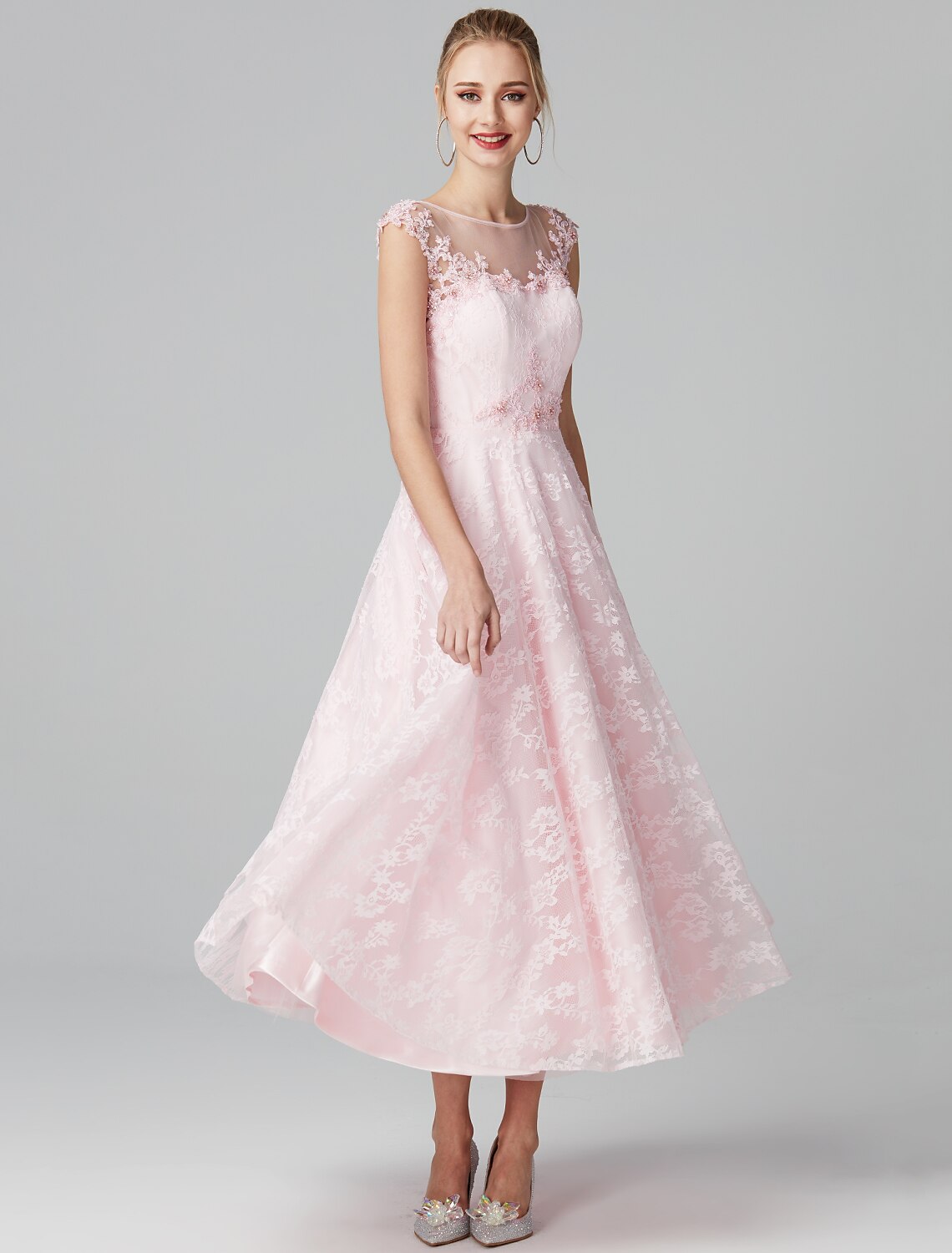 Full length view of model wearing elegant A-Line ankle-length dress.