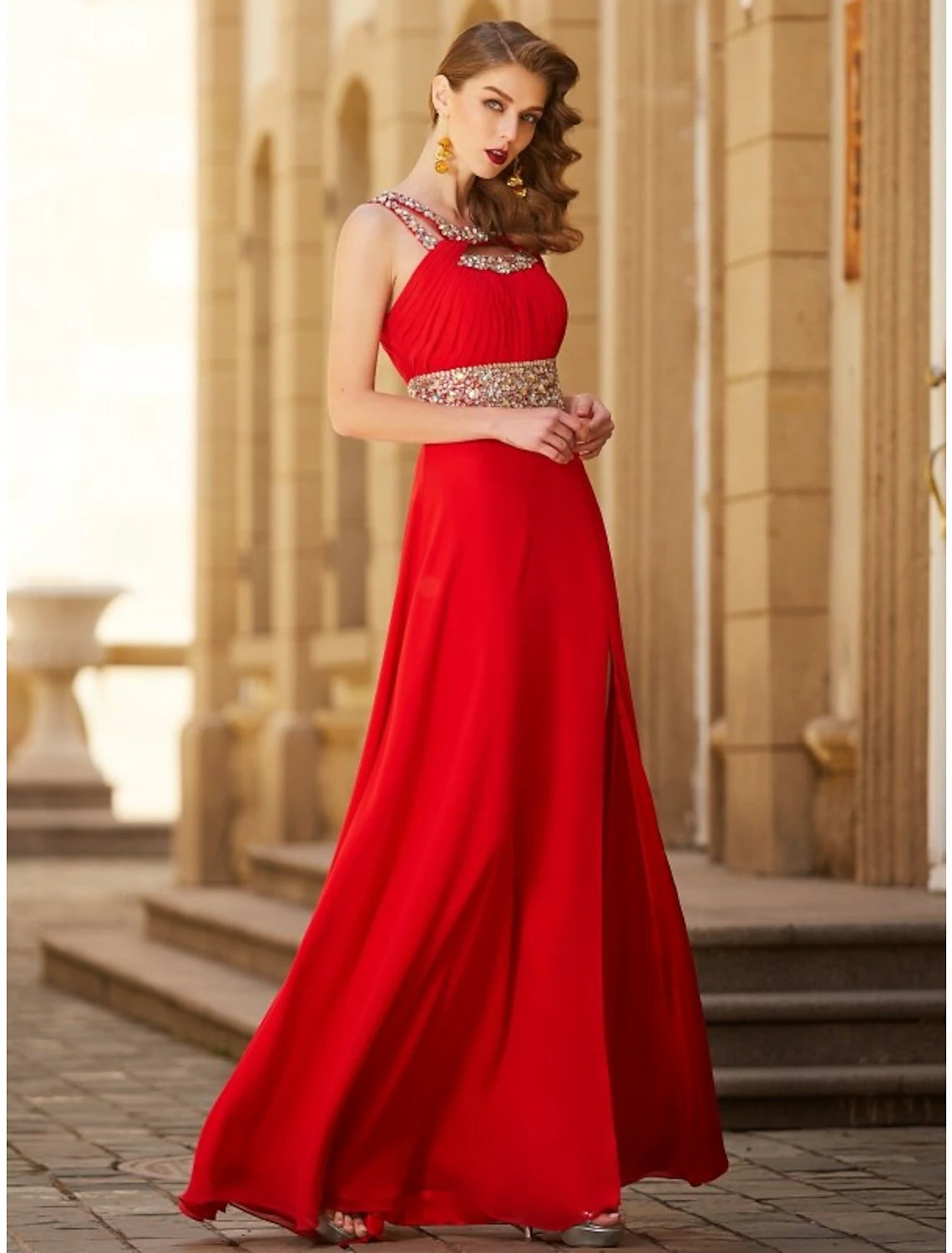 Model in a dark A-line halter neck gown, highlighting the graceful drape of the chiffon material.