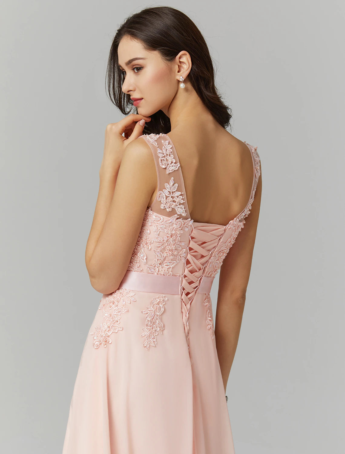 Side profile of the sleeveless A-line evening gown.