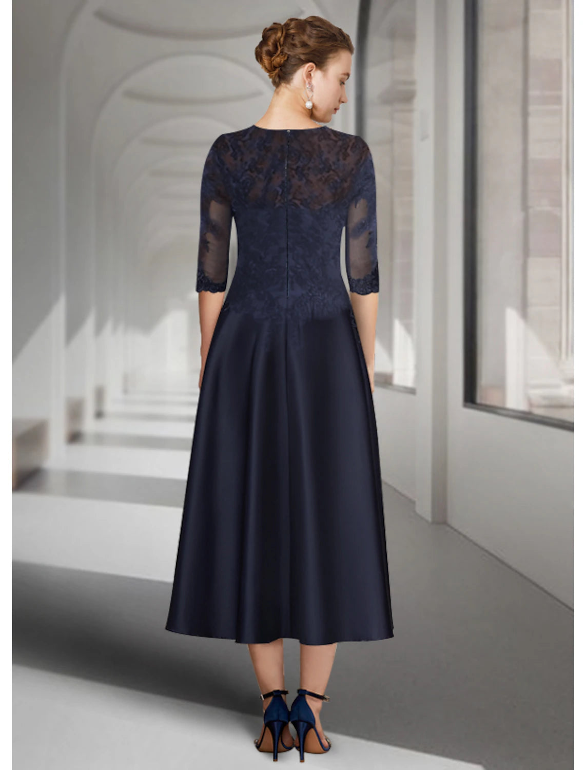 Weitese A-Line mother of the bride dress, showcasing its tea length and elegant details.
