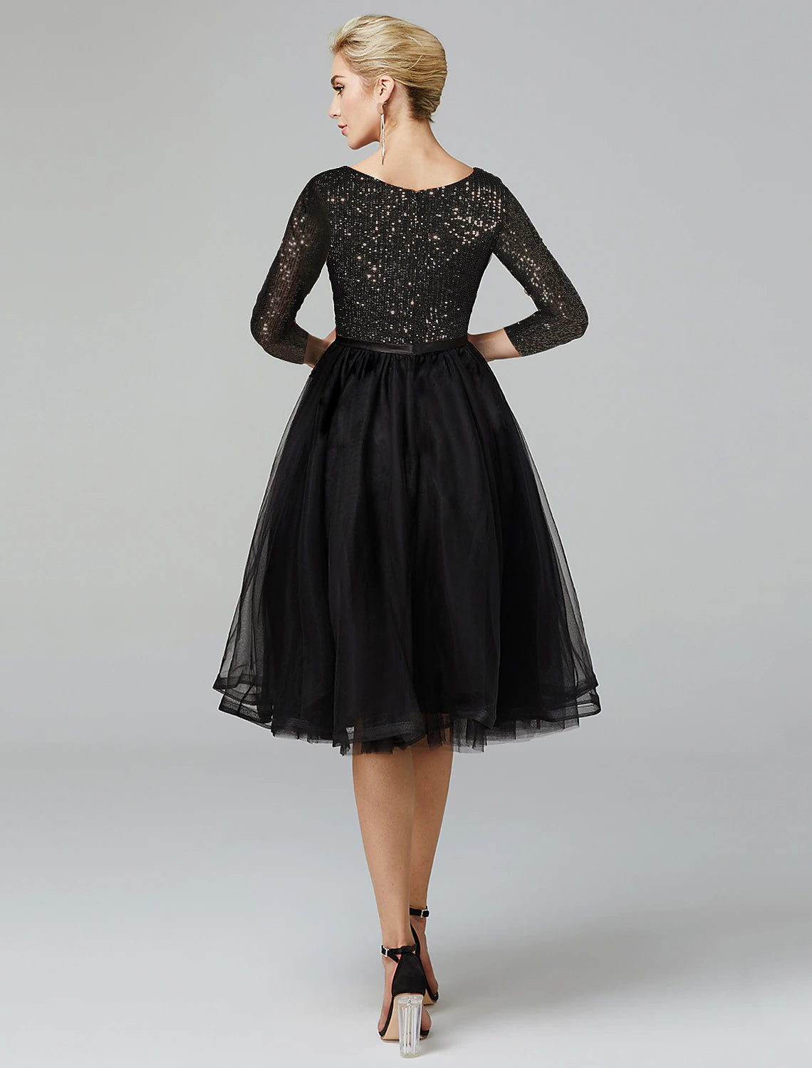 Side view of the Weitese A-Line dress, showing the tea length and sleeve detail.