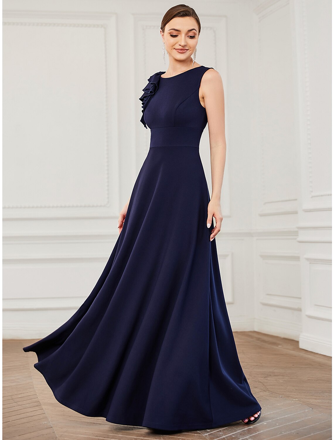 Model wearing a pure color Weitese A-line evening gown with jewel neck and draping appliques.