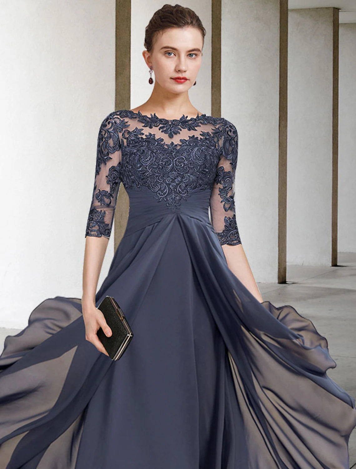 Close-up of the elegant chiffon lace and ruched appliques on the Weitese dress.