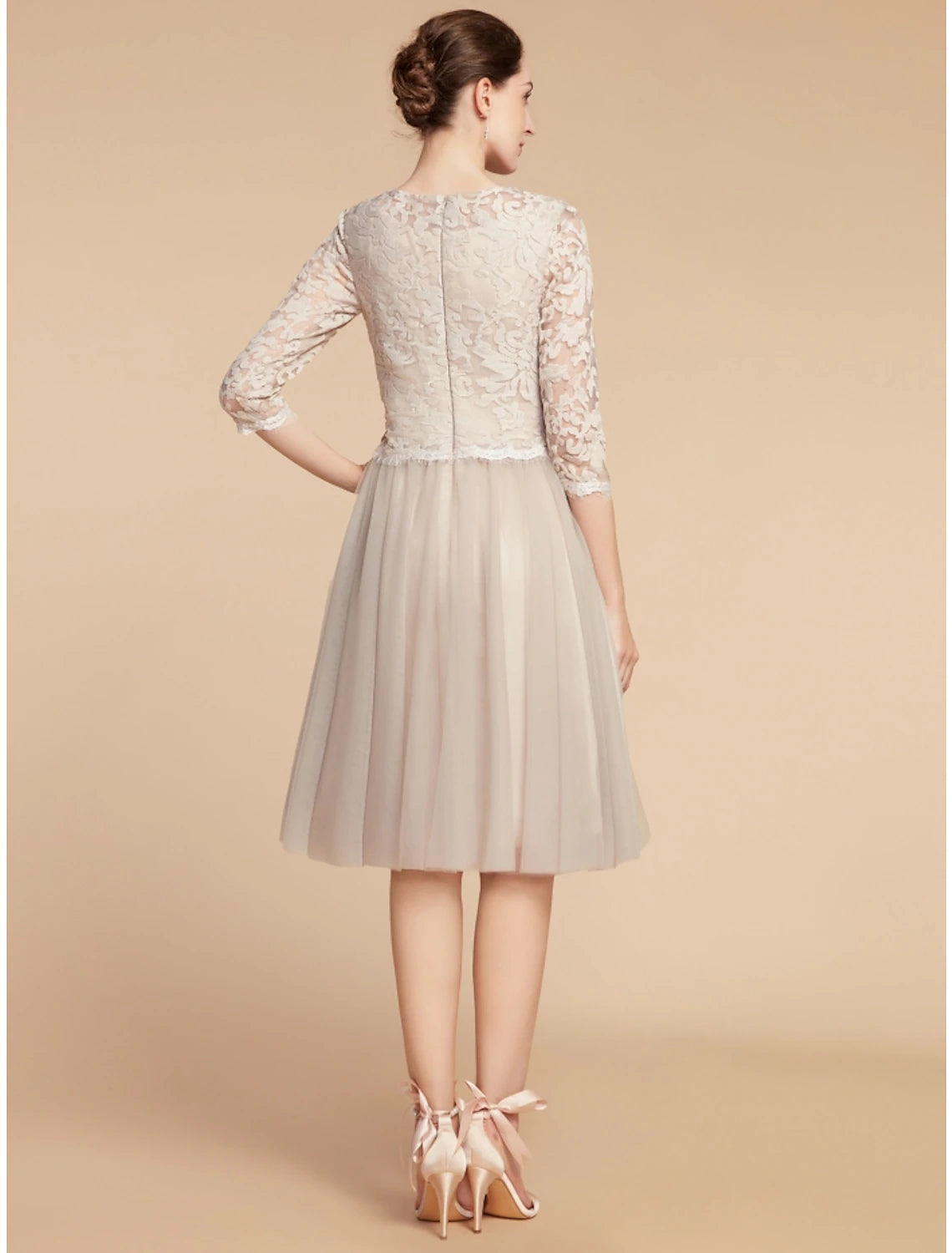 A-line Mother of the Bride dress in lace and tulle, side profile.
