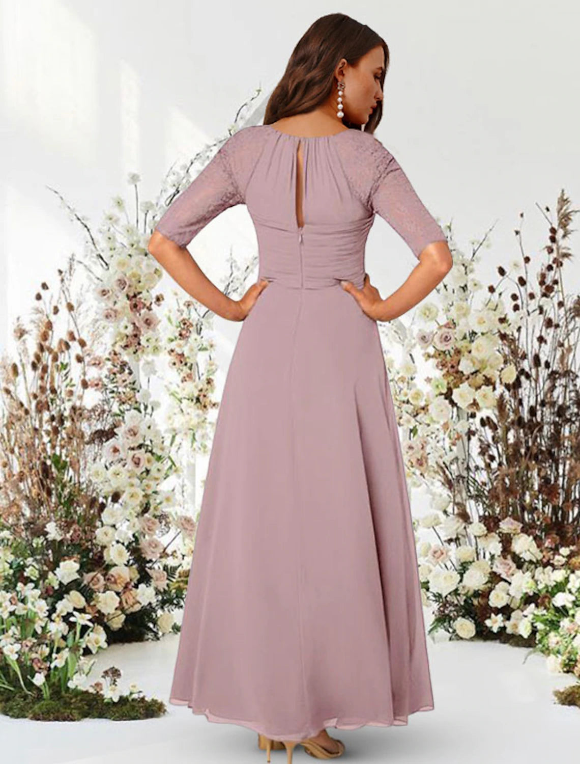 Back view of the floor-length navy A-line chiffon evening gown.