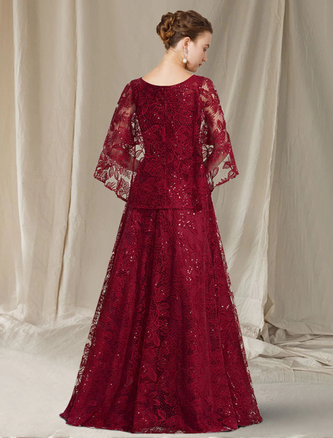 Close-up of the lace and sequin appliques on the Weitese A-Line gown.