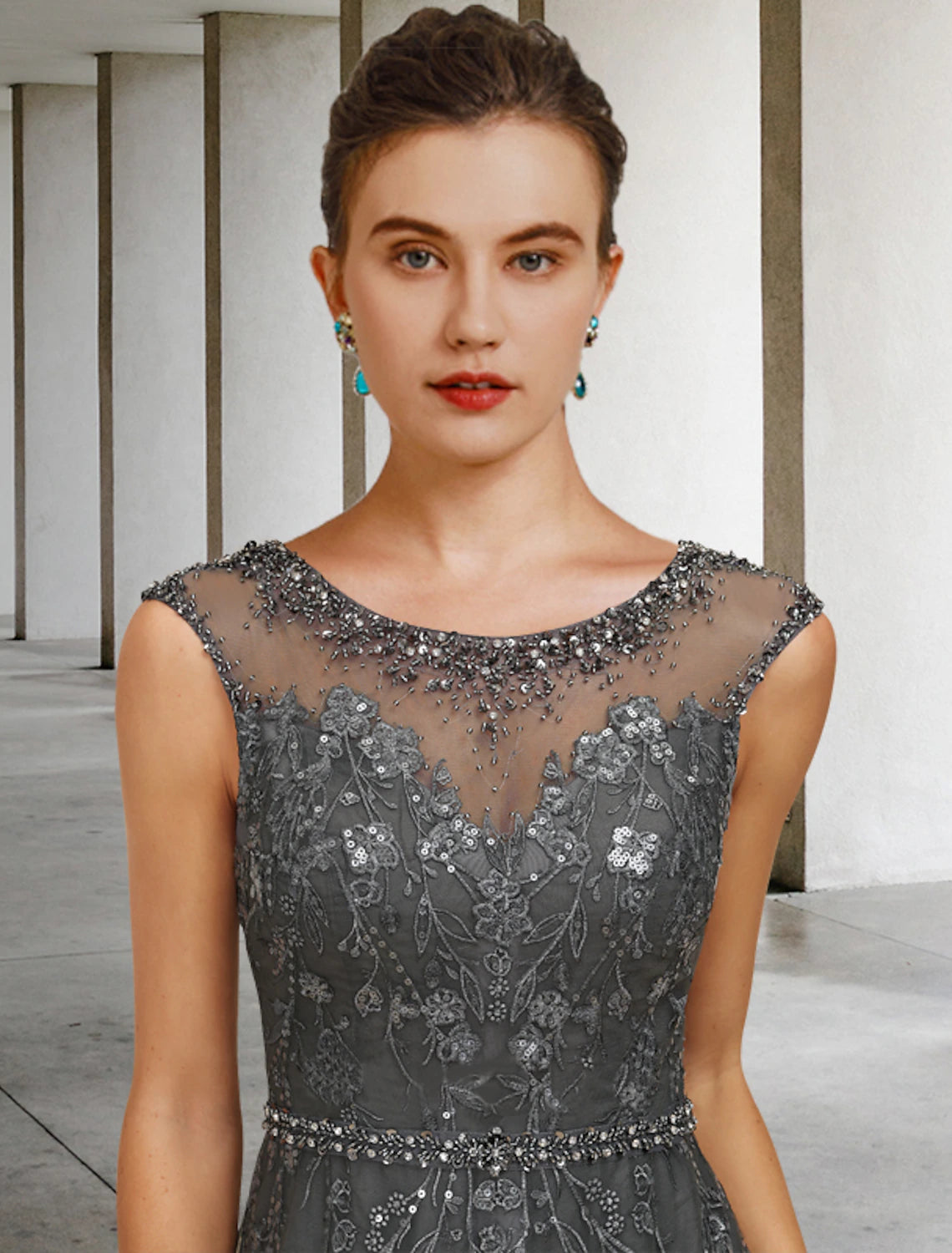 Back view of the floor-length A-Line dress with elegant lace and tulle.