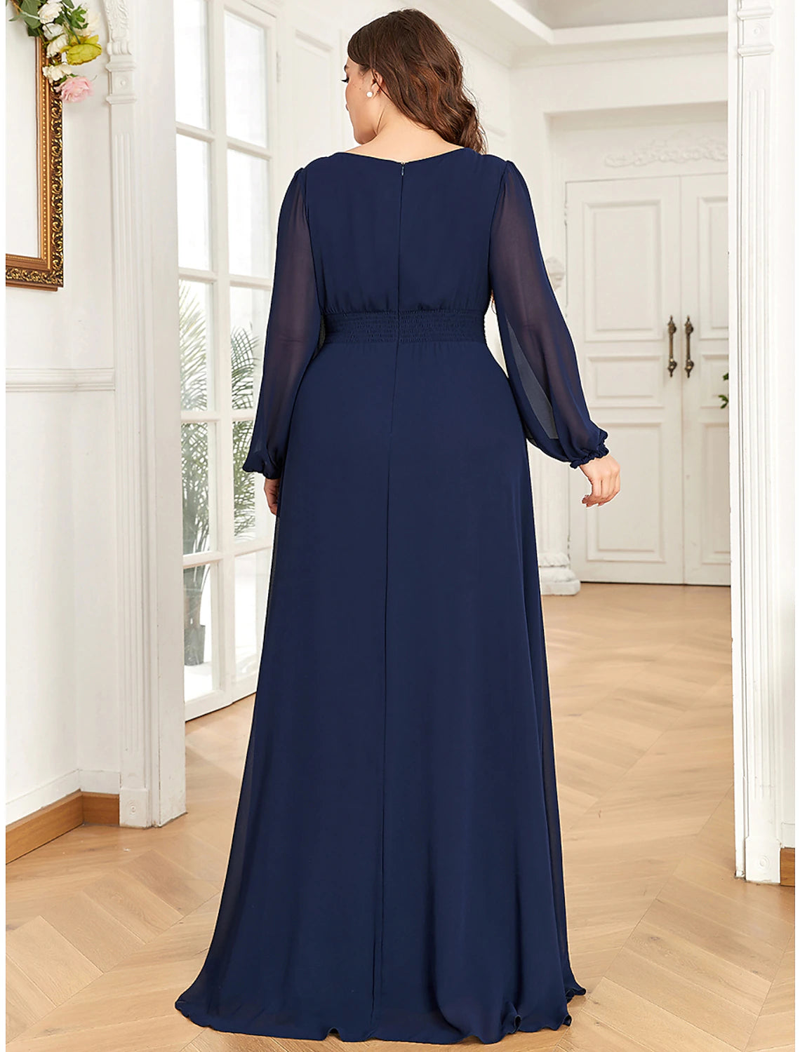 Side view of the A-line long sleeve evening dress, highlighting the draping detail.