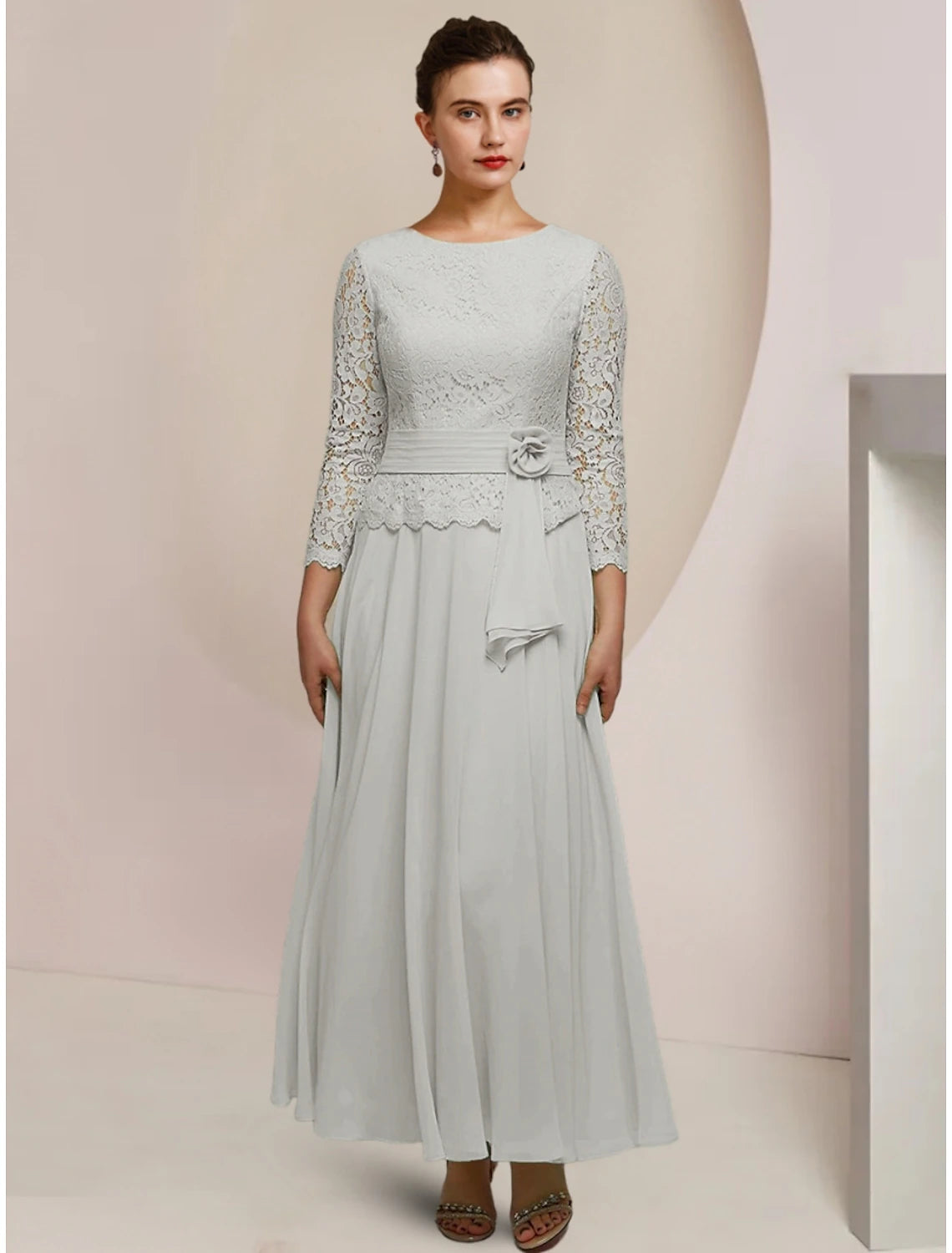 Elegant A-line chiffon mother of the bride dress with long sleeves and jewel neck.
