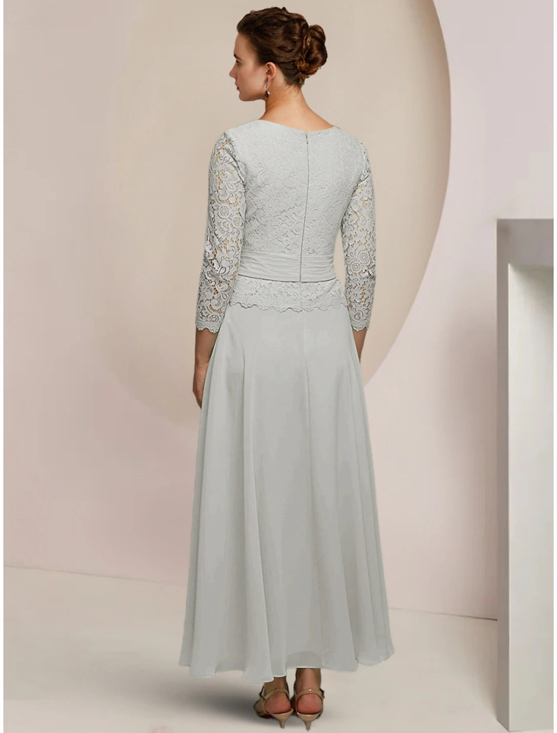 Side view of the A-line chiffon dress, highlighting its flowing silhouette.