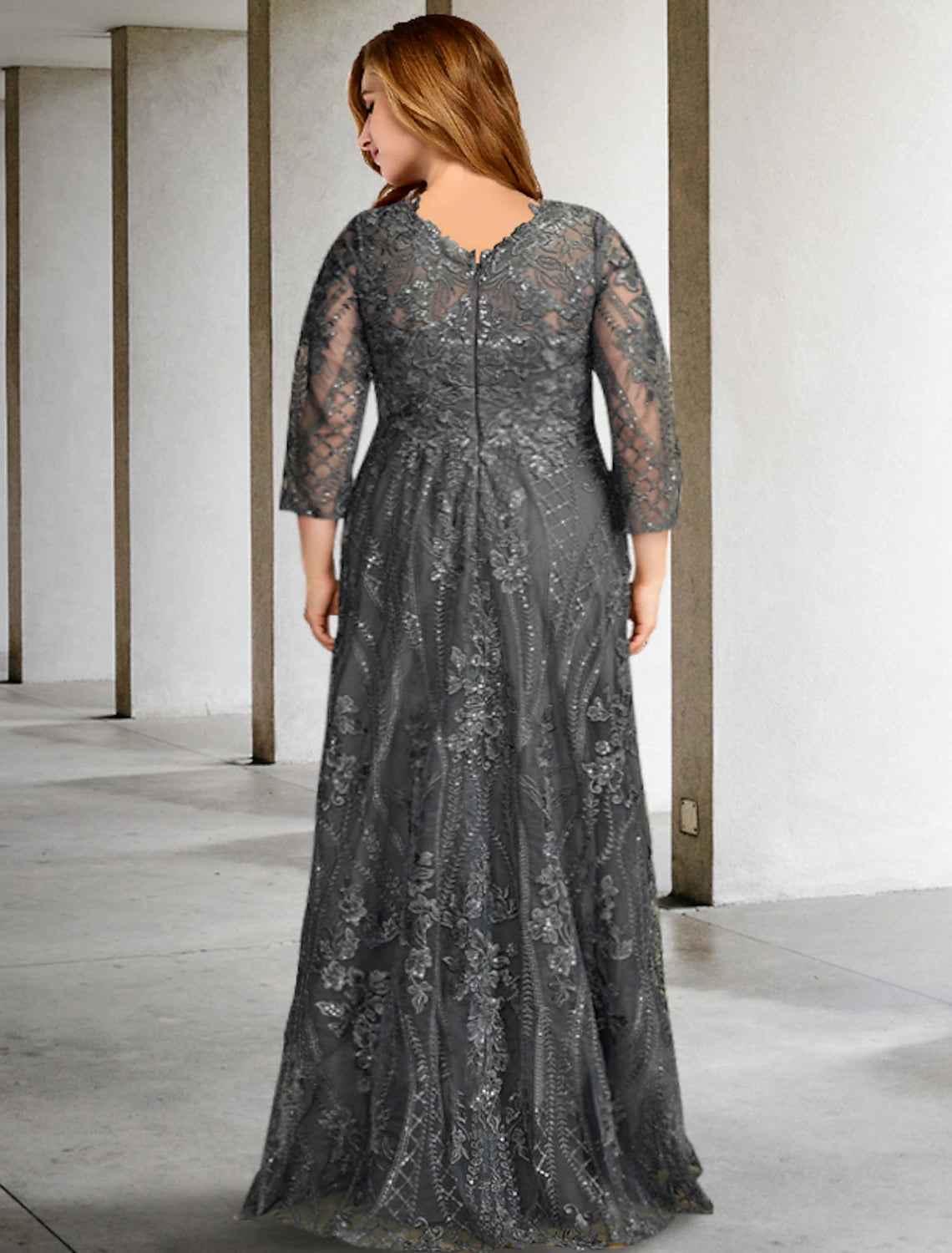 Back view of the elegant A-line chiffon gown with sweep train.