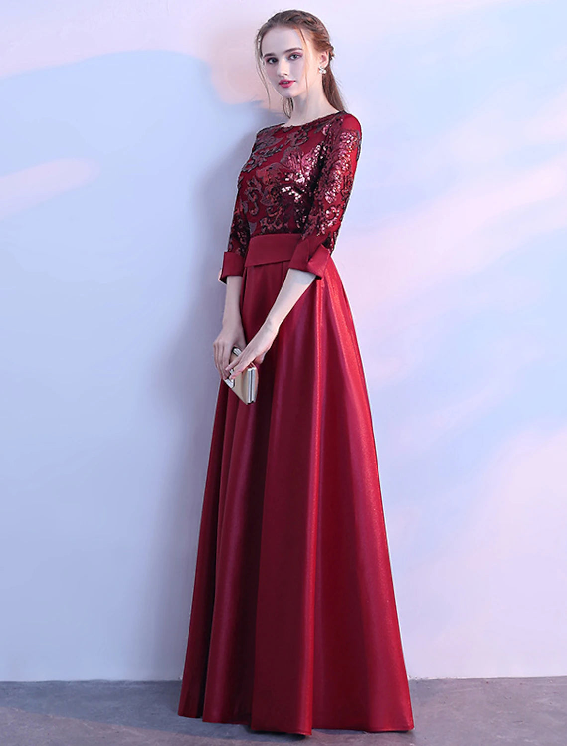 Front view of the A-line bridesmaid dress, featuring a jewel neck and long sleeves.