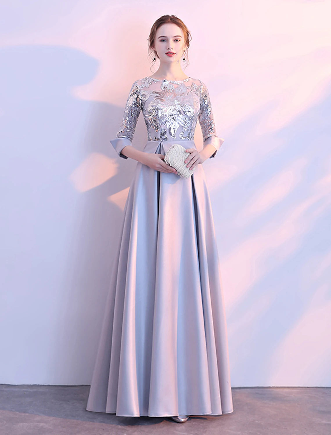 Full view of the A-line bridesmaid dress, showing the satin and tulle fabric.