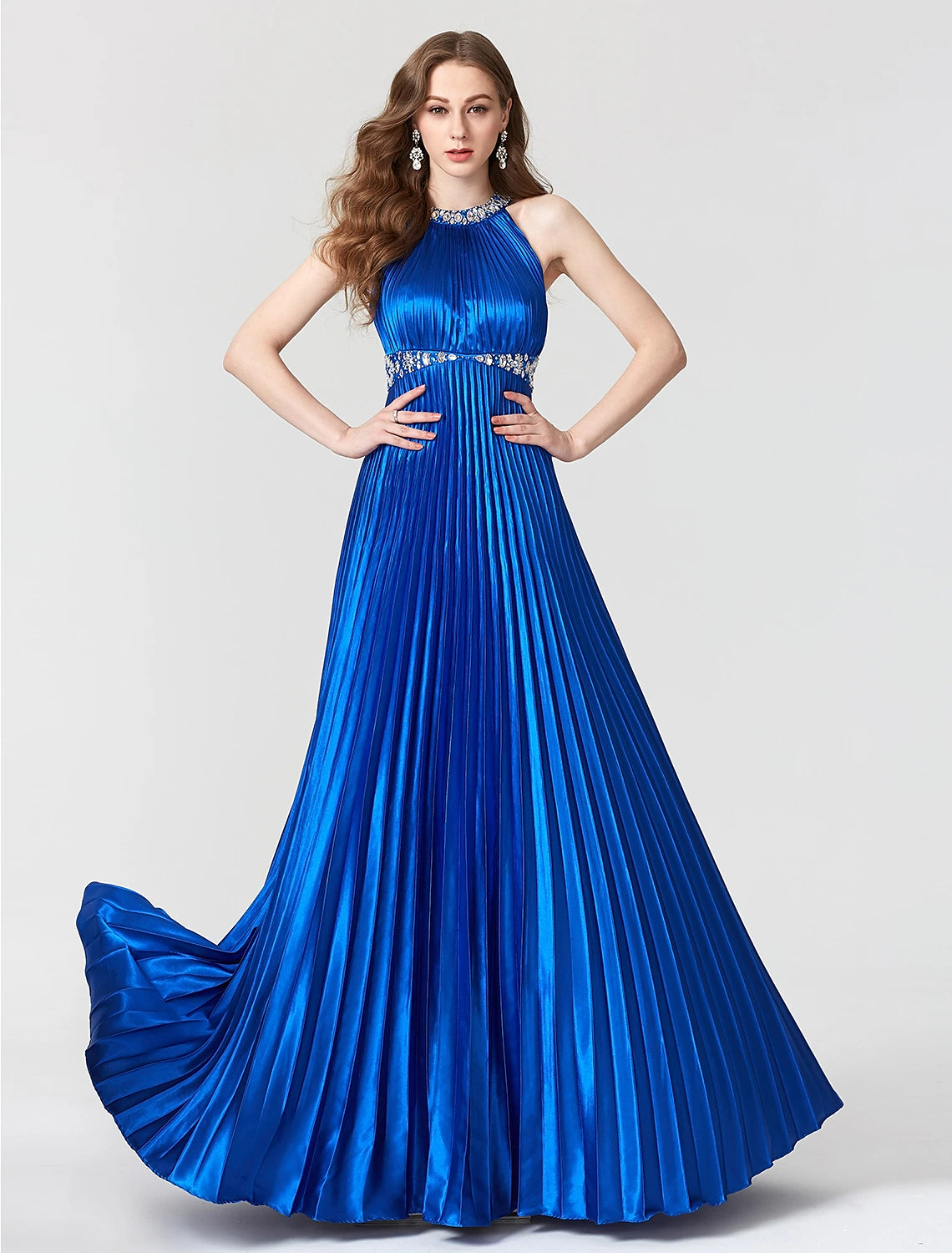 Detail of the satin fabric and pleats on the A-line cocktail dress.