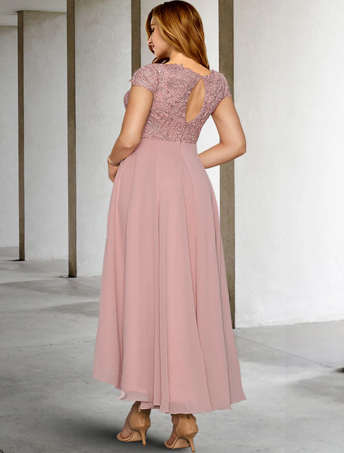 Side view of the elegant A-line chiffon dress with appliques.