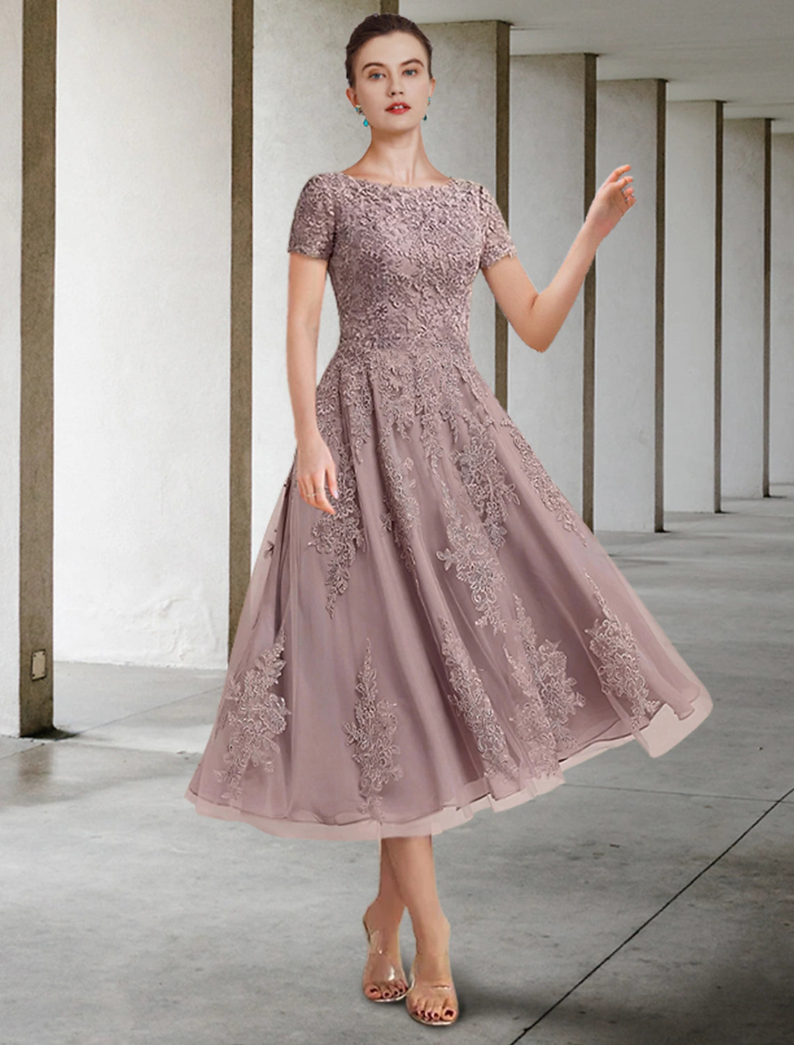 Elegant A-Line Mother of the Bride dress with jewel neck and short lace sleeves.