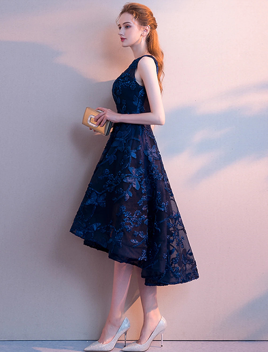 Sophisticated tulle cocktail dress with a flattering A-Line silhouette.