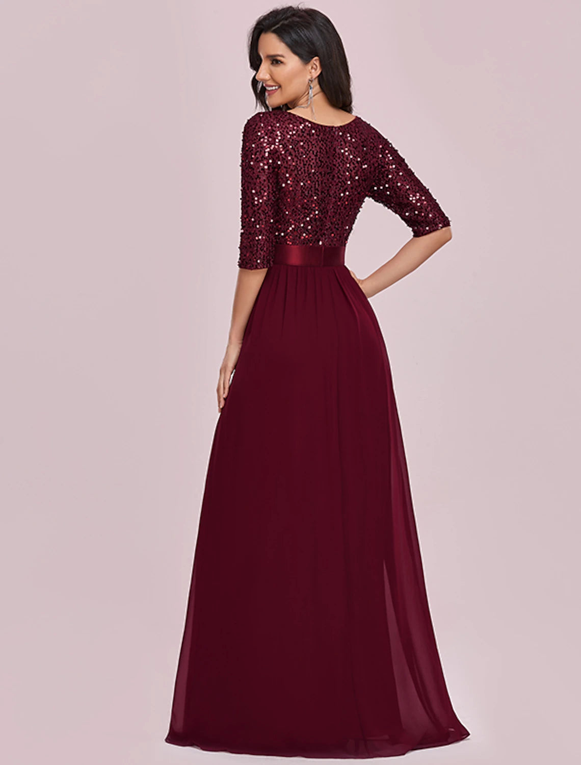 Full length view of the A-line formal evening gown.