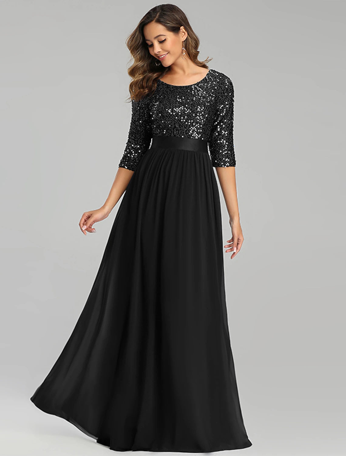 Detail of the jewel neckline and sequined bodice.