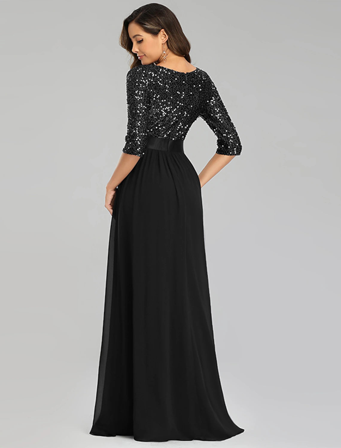 Model showcasing the flow of the floor-length tulle skirt.
