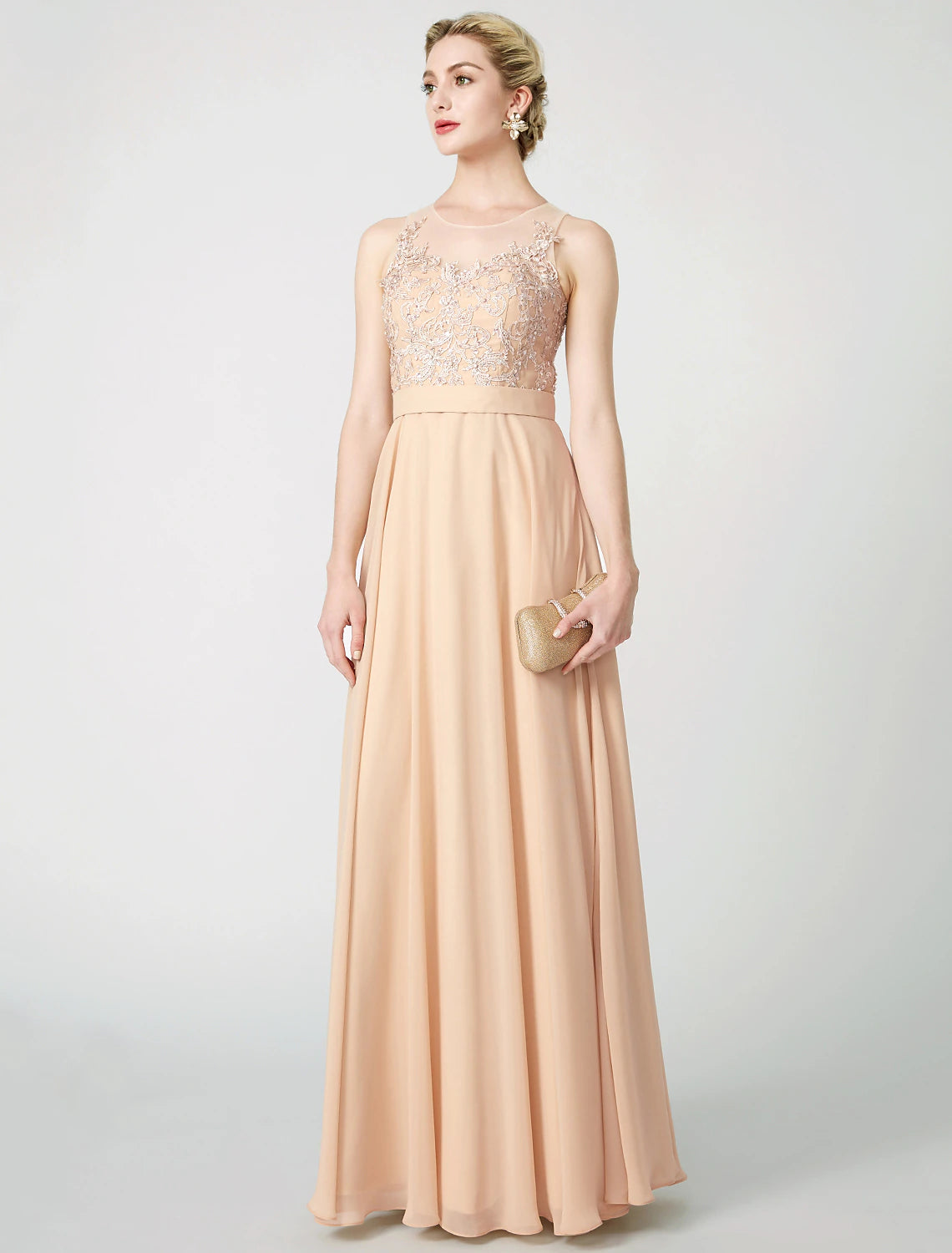 Side view of the floor-length A-line chiffon dress with flowing pleats.