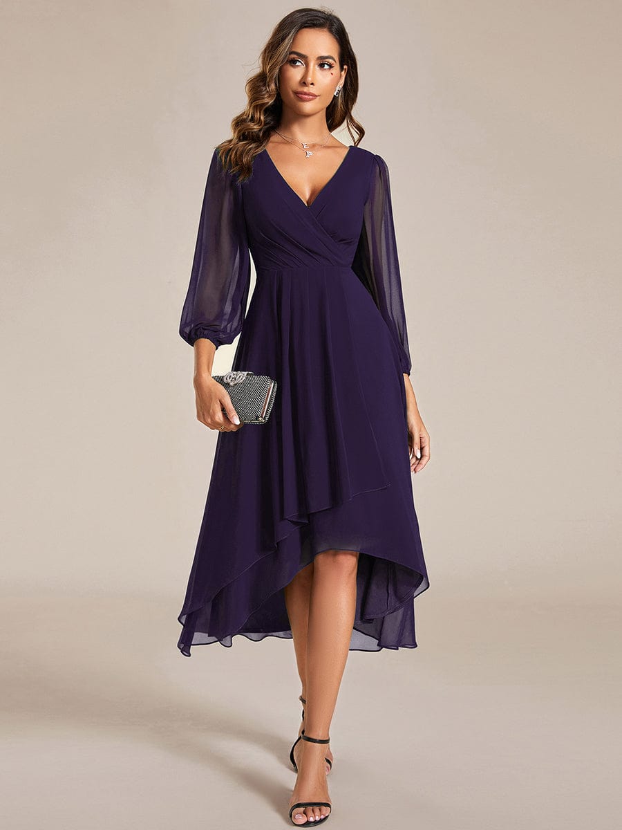 Model wearing a dark purple Weitese A-line long sleeve asymmetrical midi dress.