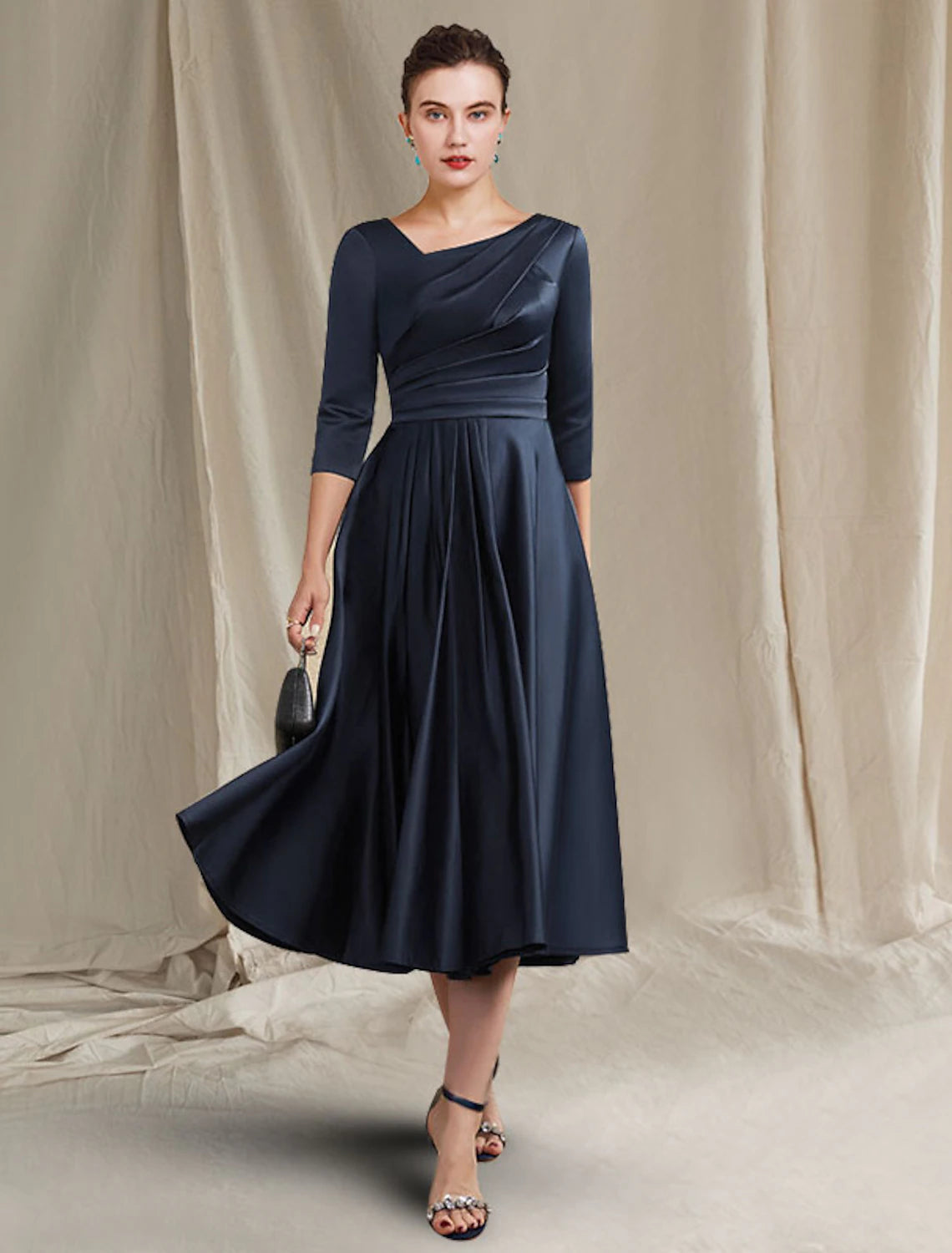 Elegant A-Line Mother of the Bride dress with bateau and V-neck, half sleeves, and ruched details.