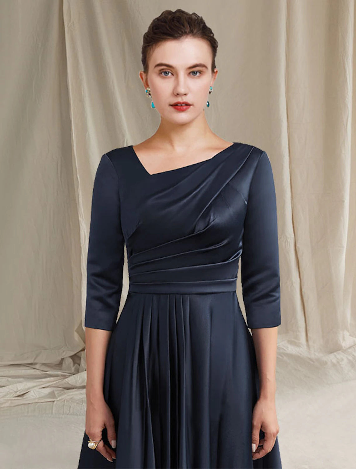 Back view of the Weitese A-Line dress, highlighting the elegant silhouette and satin fabric.