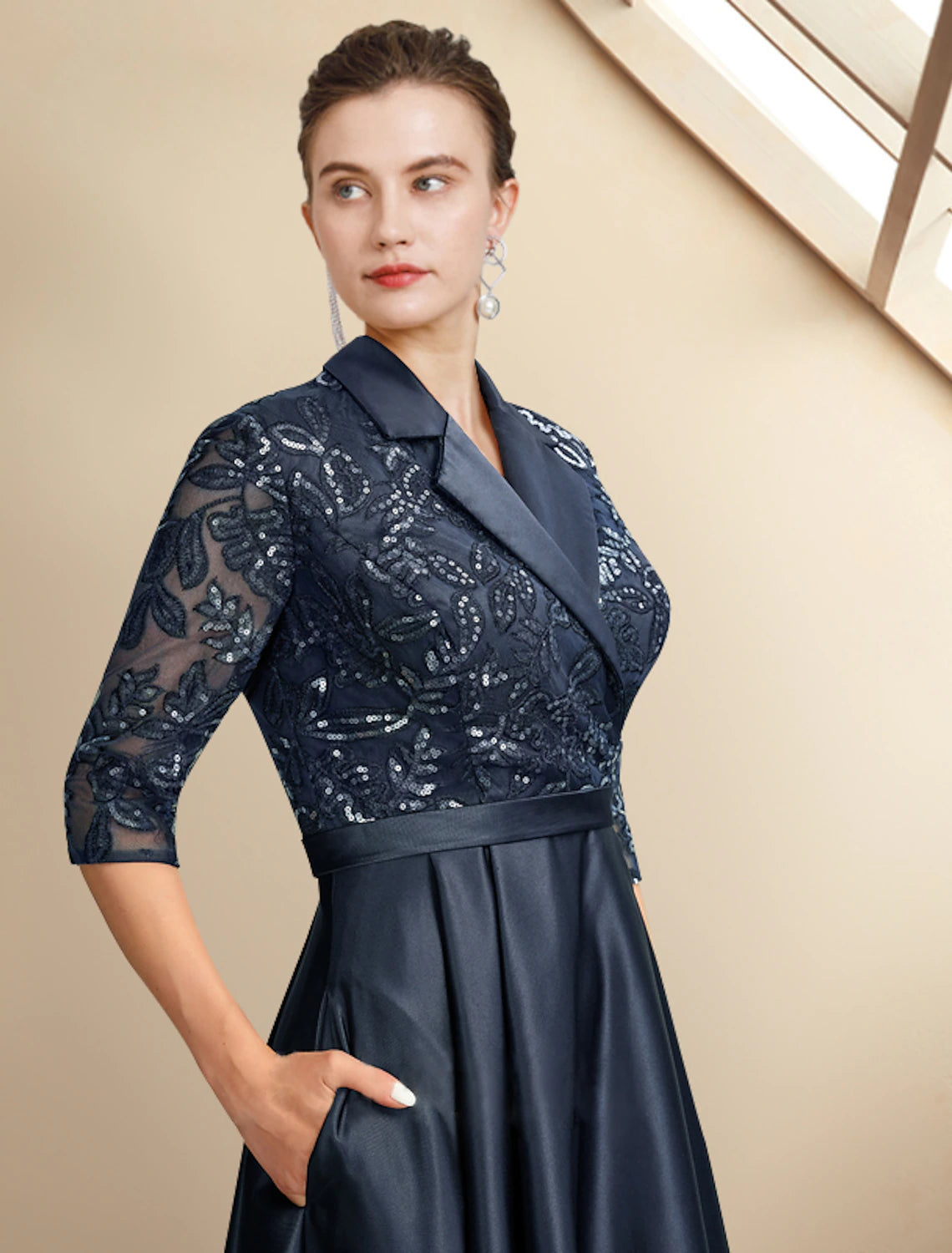 Back view of the elegant A-Line Mother of the Bride dress, showcasing the satin lace and sequin appliques.