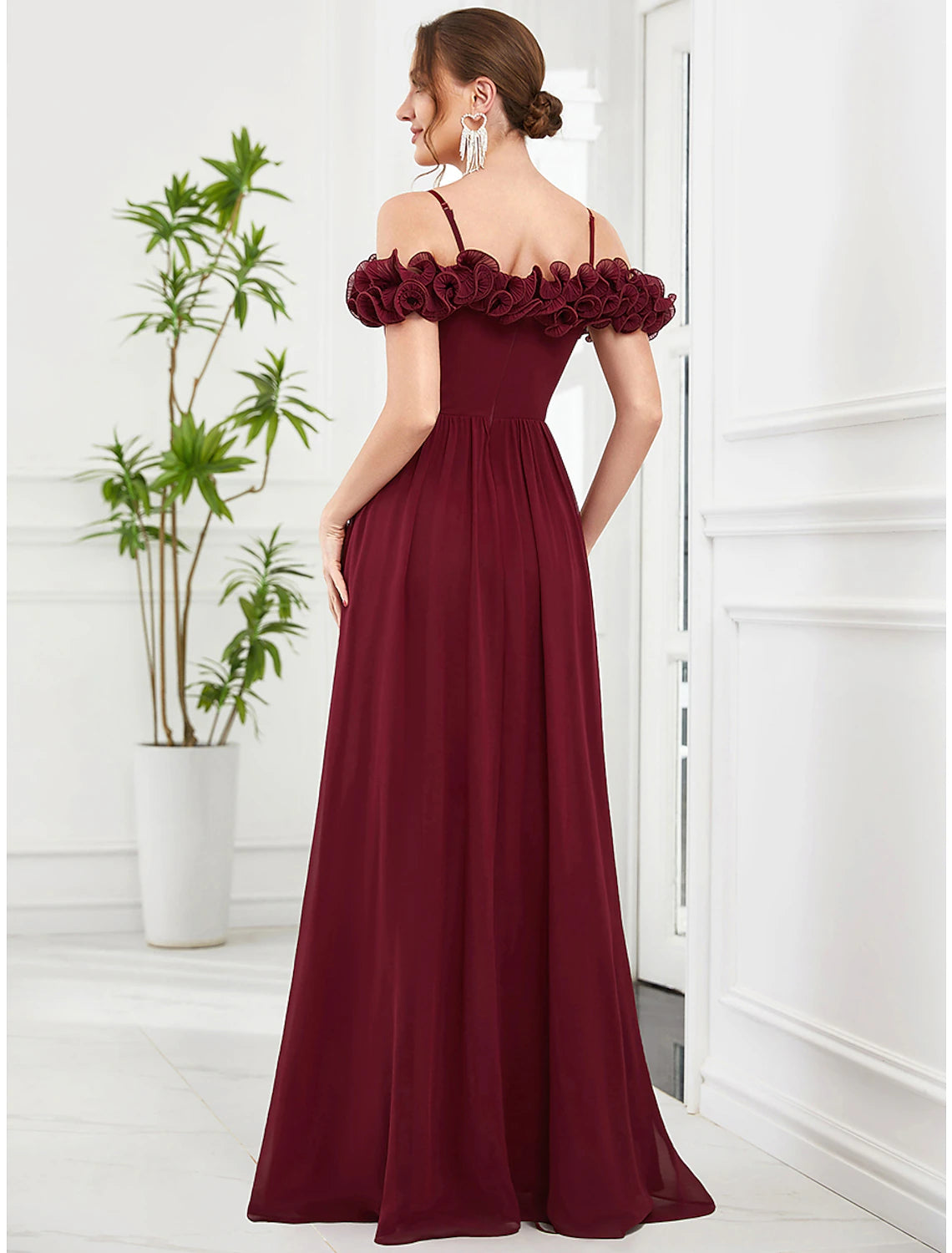 Side view of the elegant floor-length Weitese prom dress.
